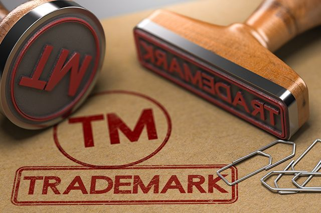 Legal expert reviewing trademark registration documents